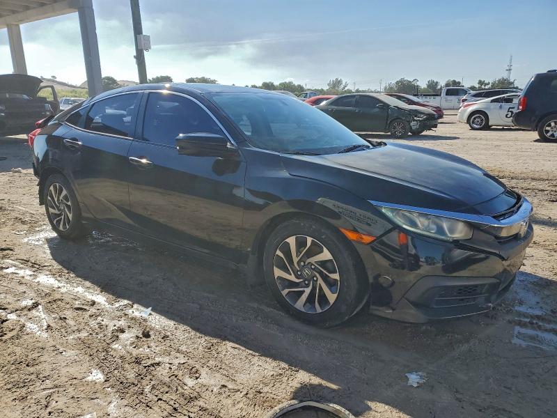 Photo 4 from auction – 2018 HONDA CIVIC EX with VIN 19XFC2F7XJE014028