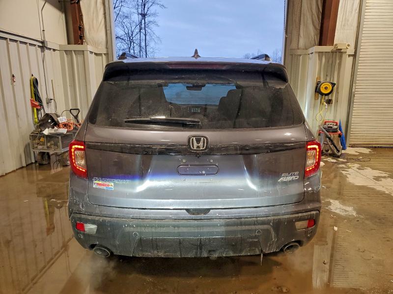 Photo 6 from auction – 2021 HONDA PASSPORT E with VIN 5FNYF8H09MB026690