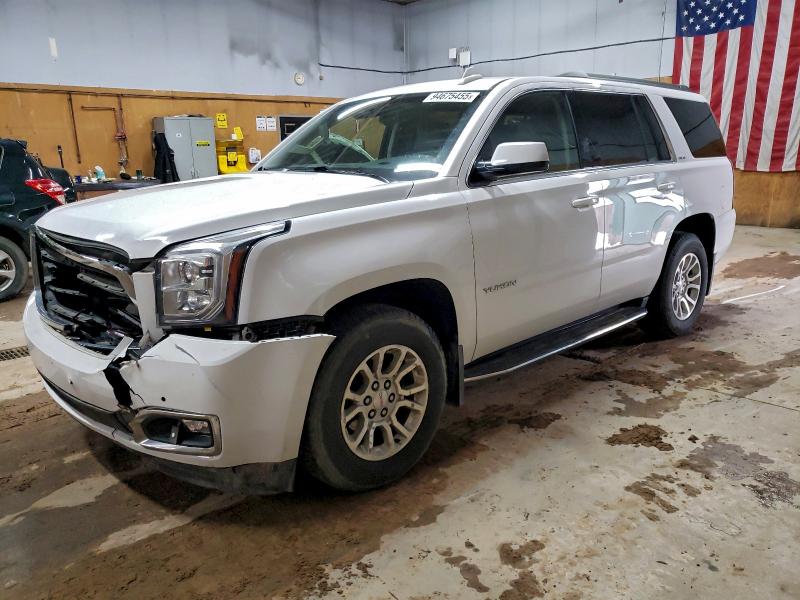 GMC YUKON SLE 2016 with VIN 1GKS2AKC6GR454120 - Photo from auction