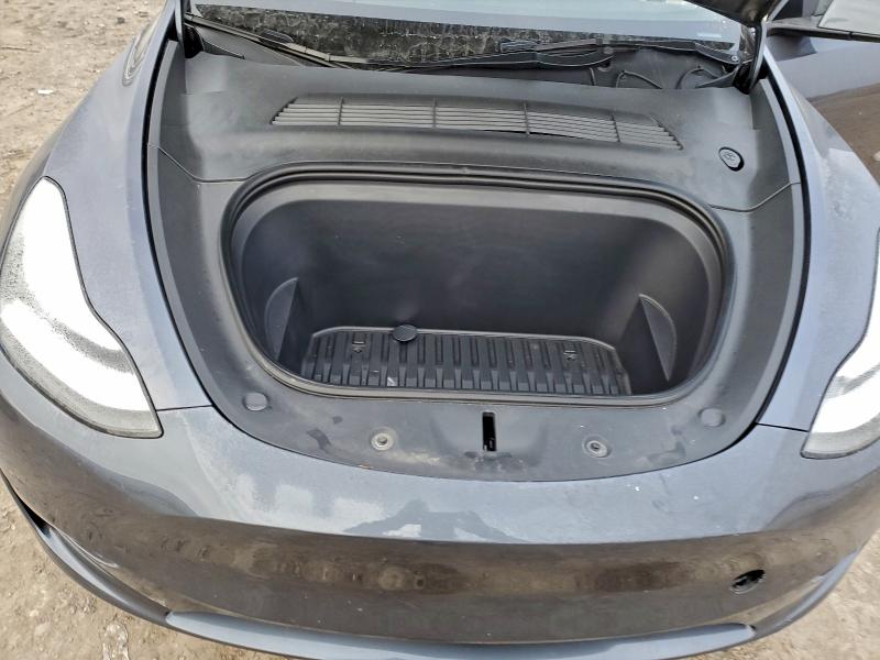 Photo 11 from auction – 2023 TESLA MODEL Y with VIN 7SAYGDEE0PA056090
