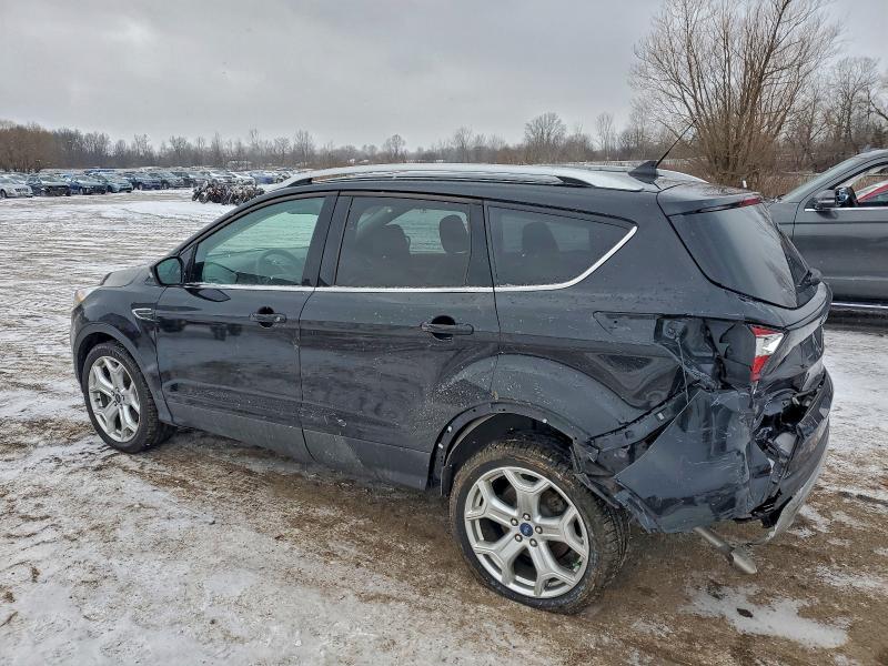 Photo 2 from auction – 2019 FORD ESCAPE TIT with VIN 1FMCU9J9XKUB98516