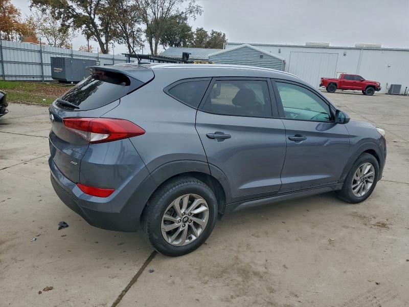 Photo 3 from auction – 2016 HYUNDAI TUCSON LIM with VIN KM8J3CA42GU074629