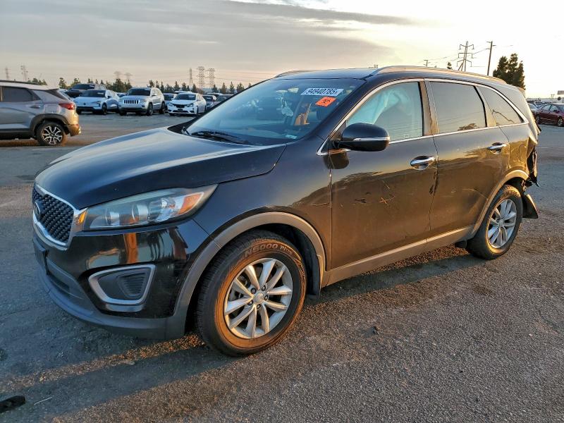 KIA SORENTO LX 2016 with VIN 5XYPG4A56GG153207 - Photo from auction