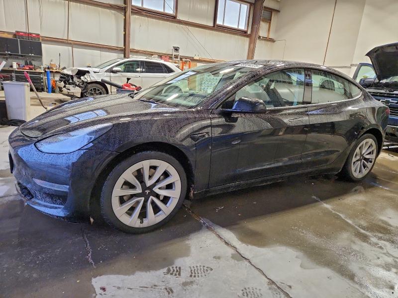 TESLA MODEL 3 2023 with VIN 5YJ3E1EAXPF384399 - Photo from auction