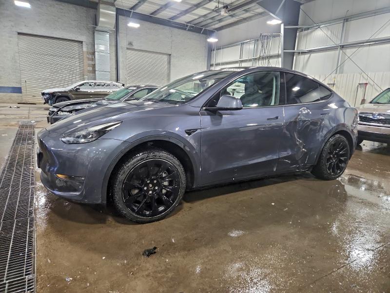 TESLA MODEL Y 2023 with VIN 7SAYGDEE1PF831211 - Photo from auction