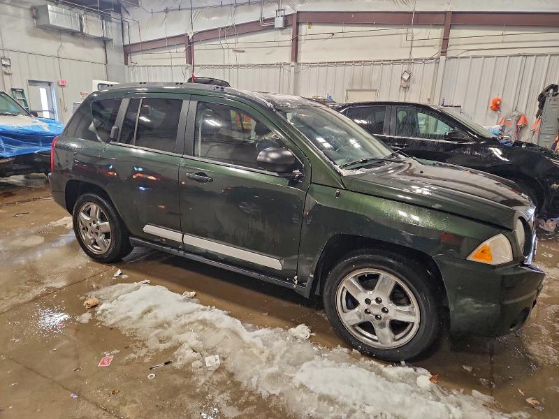 Photo 4 from auction – 2010 JEEP COMPASS LI with VIN 1J4NF5FB2AD640807