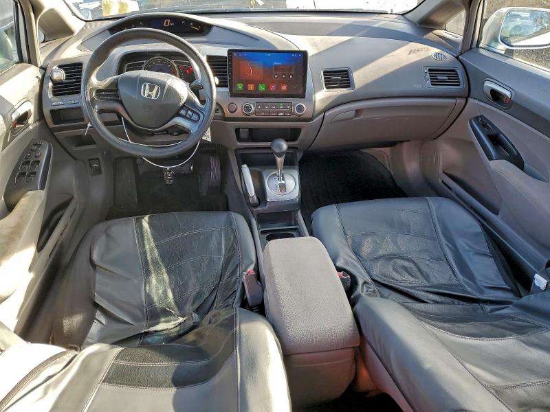 Photo 8 from auction – 2006 HONDA CIVIC LX with VIN 2HGFA16536H516892