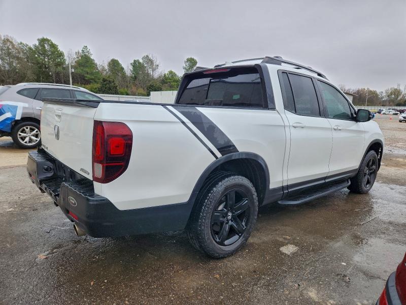 Photo 3 from auction – 2022 HONDA RIDGELINE with VIN 5FPYK3F84NB030484