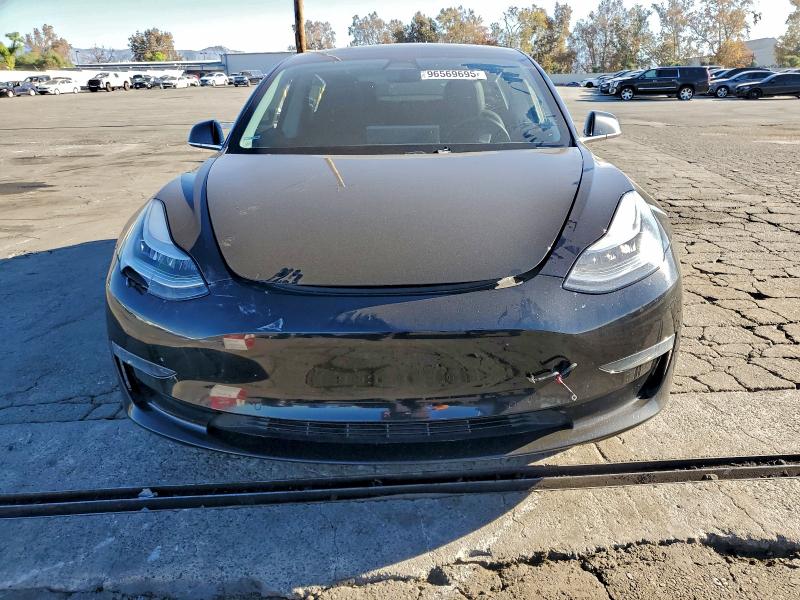 Photo 5 from auction – 2019 TESLA MODEL 3 with VIN 5YJ3E1EB3KF384228