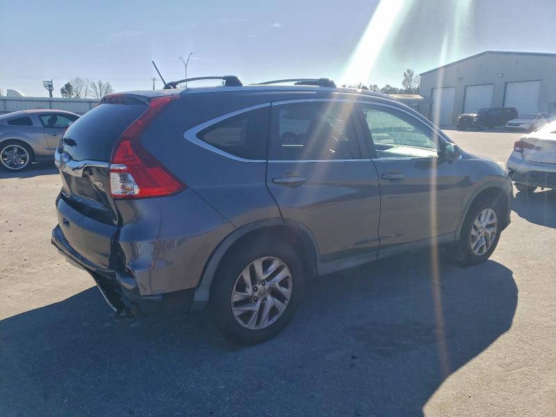 Photo 3 from auction – 2016 HONDA CR-V EX with VIN 2HKRM4H55GH673852