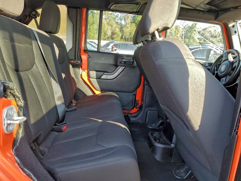 Photo 11 from auction – 2015 JEEP WRANGLER U with VIN 1C4BJWDG0FL735990