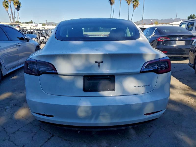 Photo 6 from auction – 2022 TESLA MODEL 3 with VIN 5YJ3E1EB0NF130383