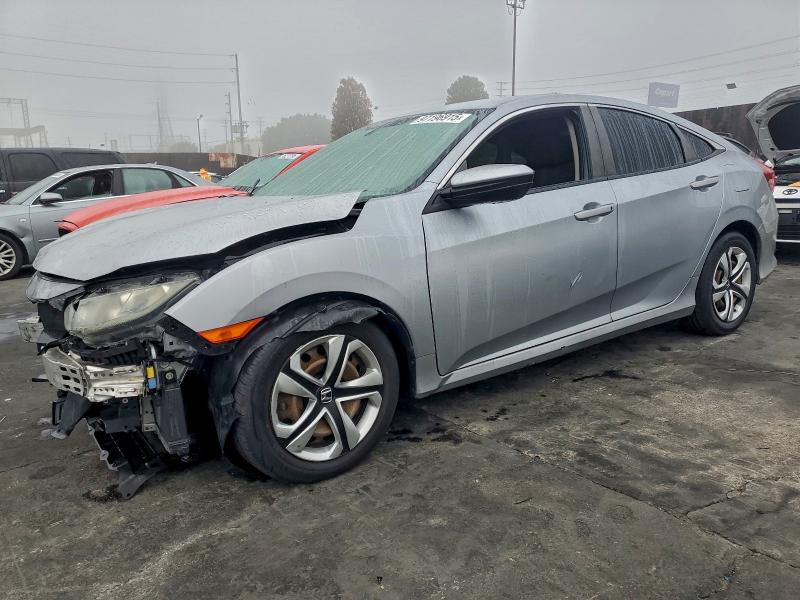 HONDA CIVIC LX 2017 with VIN 2HGFC2F58HH575102 - Photo from auction