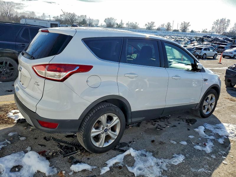 Photo 3 from auction – 2014 FORD ESCAPE SE with VIN 1FMCU9G9XEUD73181