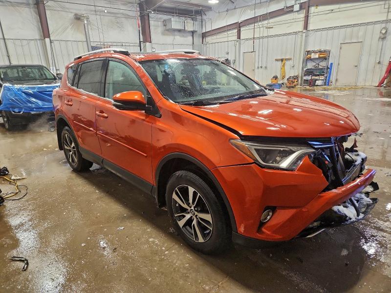 Photo 4 from auction – 2016 TOYOTA RAV4 XLE with VIN 2T3RFREV4GW490155