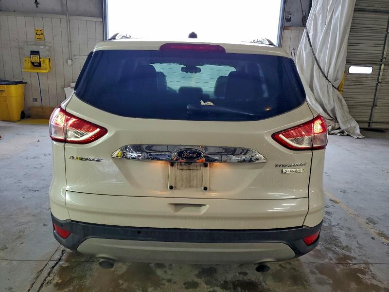 Foto 6 de la subasta – 2015 FORD ESCAPE TIT con VIN 1FMCU9J92FUC77359