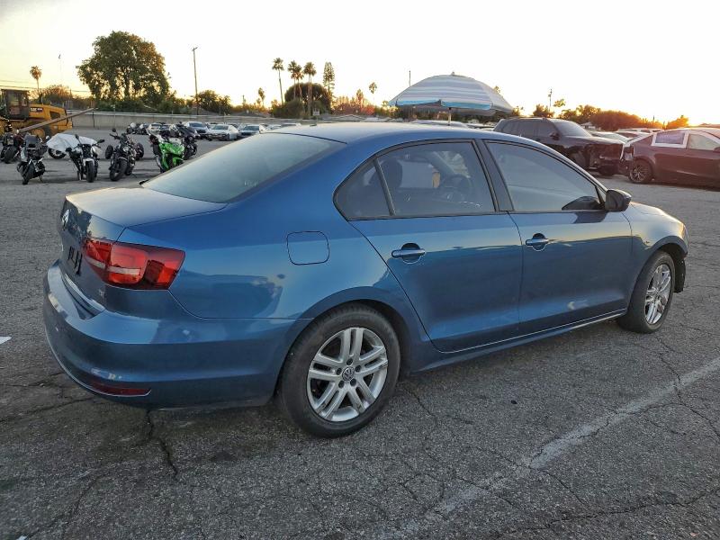 Photo 3 from auction – 2018 VOLKSWAGEN JETTA S with VIN 3VW2B7AJ5JM222743