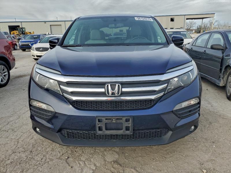 Photo 5 from auction – 2016 HONDA PILOT EXL with VIN 5FNYF6H56GB051986