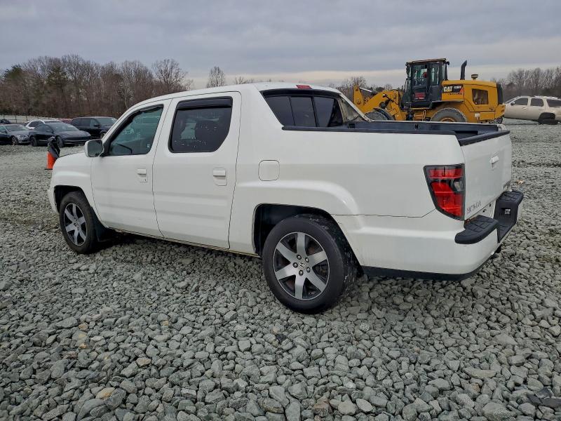 Photo 2 from auction – 2014 HONDA RIDGELINE with VIN 5FPYK1F61EB009899