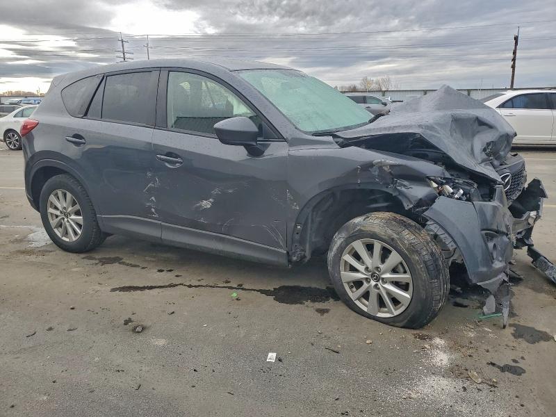 Photo 4 from auction – 2014 MAZDA CX-5 TOURI with VIN JM3KE4CY2E0392187