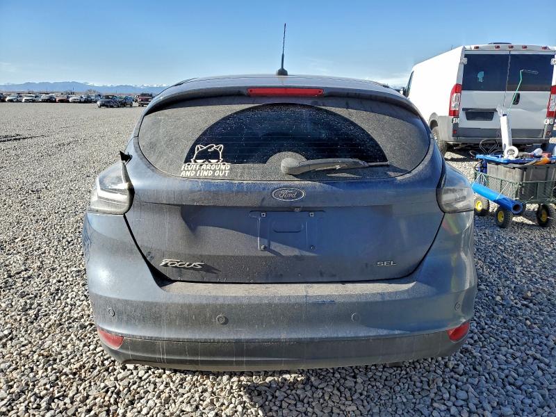 Photo 6 from auction – 2018 FORD FOCUS with VIN 1FADP3M2XJL224411