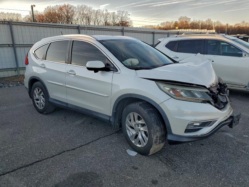 Photo 4 from auction – 2015 HONDA CR-V EXL with VIN 5J6RM4H72FL021146