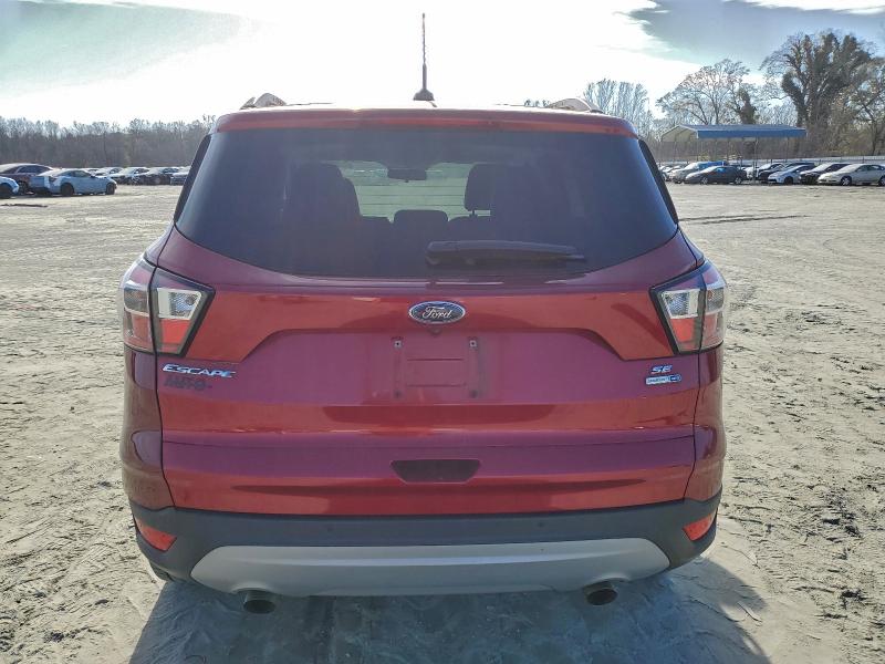 Photo 6 from auction – 2017 FORD ESCAPE SE with VIN 1FMCU9G92HUD68223