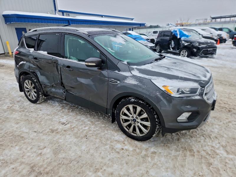 Photo 4 from auction – 2017 FORD ESCAPE TIT with VIN 1FMCU9J90HUC91103