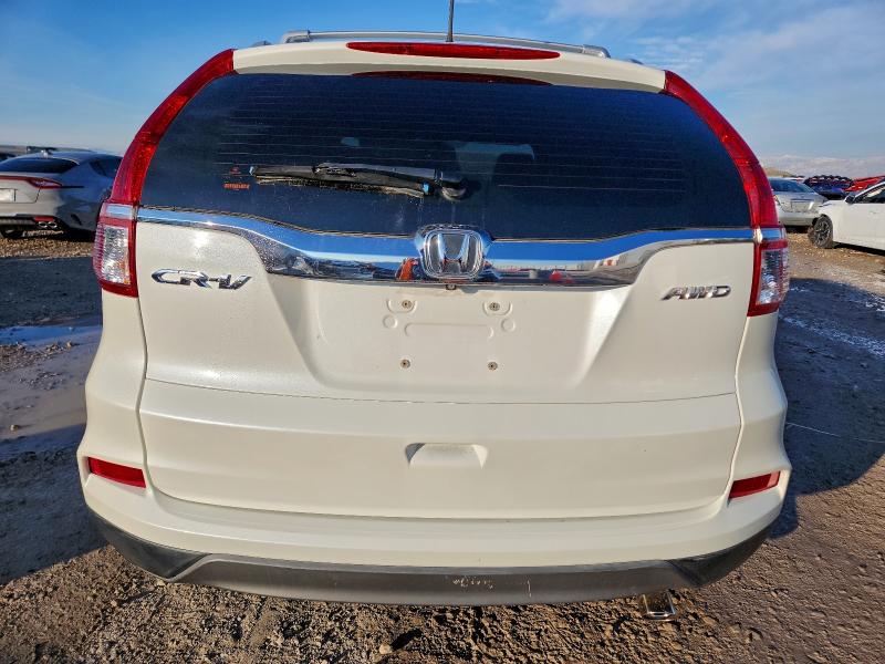 Photo 6 from auction – 2016 HONDA CR-V LX with VIN 5J6RM4H37GL042105