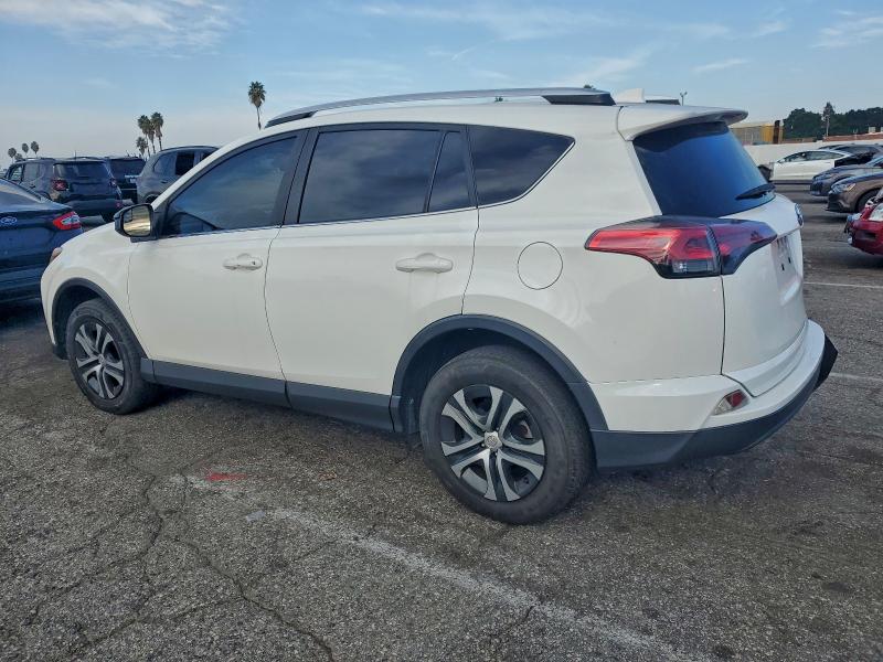 Photo 2 from auction – 2018 TOYOTA RAV4 LE with VIN JTMZFREV0JJ742280