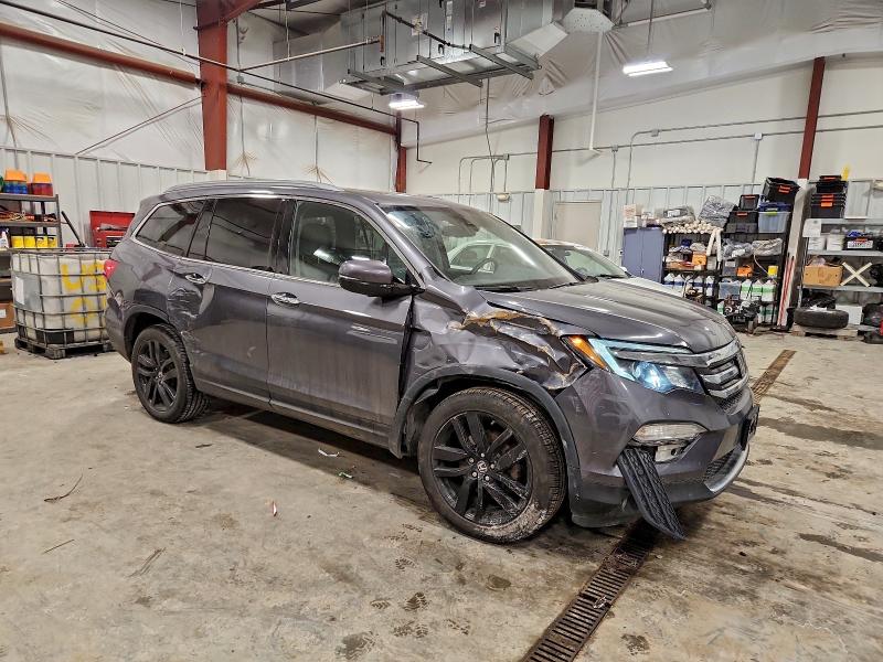 Photo 4 from auction – 2016 HONDA PILOT ELIT with VIN 5FNYF6H07GB050544