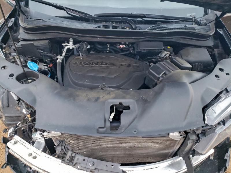 Photo 12 from auction – 2021 HONDA PASSPORT with VIN 5FNYF7H28MB009536