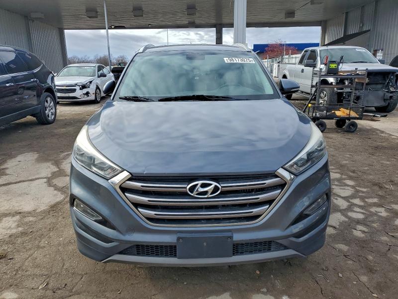 Photo 5 from auction – 2016 HYUNDAI TUCSON LIM with VIN KM8J3CA22GU247225