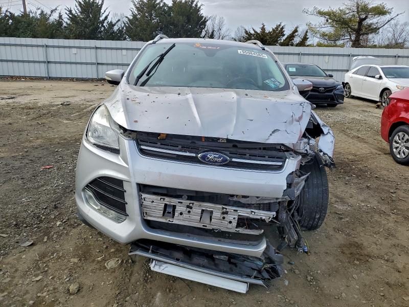 Photo 5 from auction – 2016 FORD ESCAPE with VIN 1FMCU9J91GUB51415