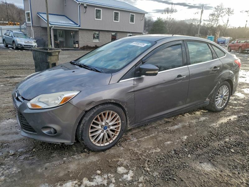 FORD FOCUS SEL 2012 with VIN 1FAHP3H26CL357262 - Photo from auction