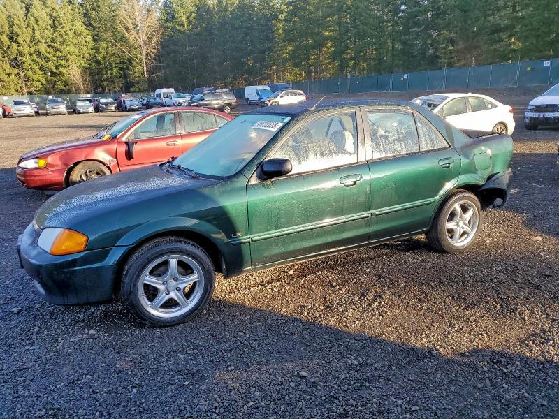 MAZDA PROTEGE DX 2000 with VIN JM1BJ2229Y0196516 - Photo from auction