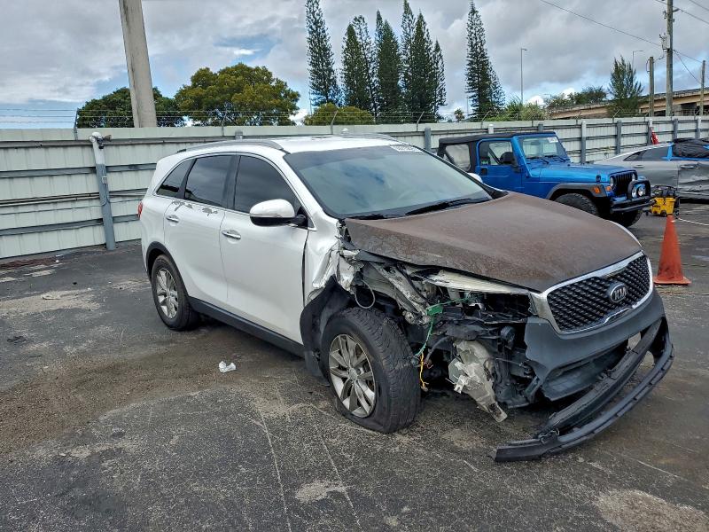Photo 4 from auction – 2017 KIA SORENTO LX with VIN 5XYPG4A35HG188708