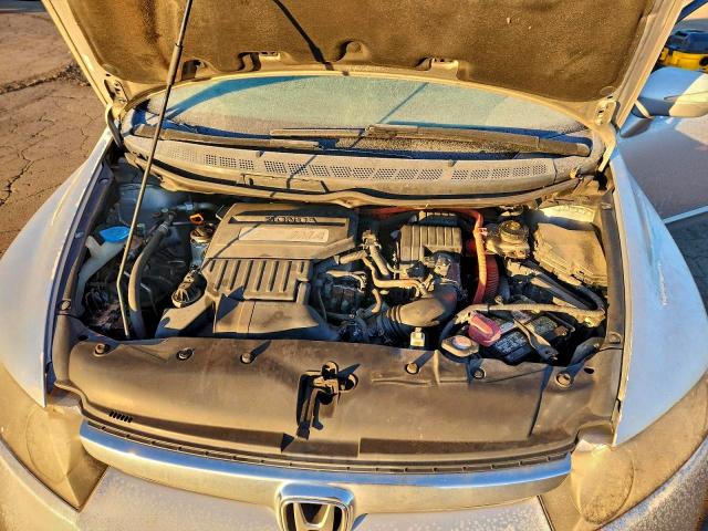 Photo 11 from auction – 2007 HONDA CIVIC HYBR with VIN JHMFA36257S011963