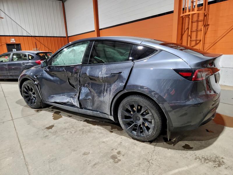 Photo 2 from auction – 2022 TESLA MODEL Y with VIN 7SAYGAEEXNF336825