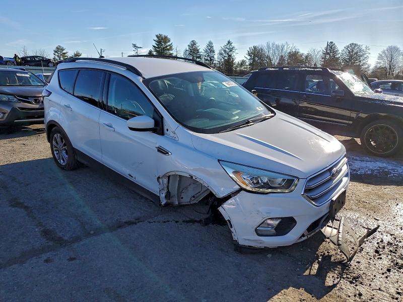 Photo 4 from auction – 2017 FORD ESCAPE with VIN 1FMCU9GD0HUD99300