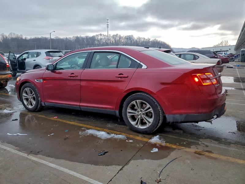 Photo 2 from auction – 2014 FORD TAURUS with VIN 1FAHP2E84EG173792