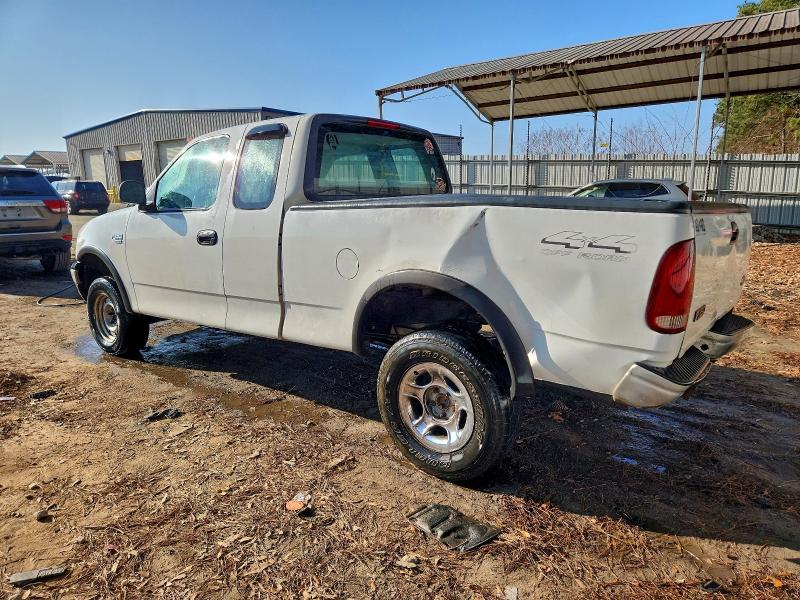 Photo 2 from auction – 1999 FORD F150 with VIN 1FTRX18W0XNA26256