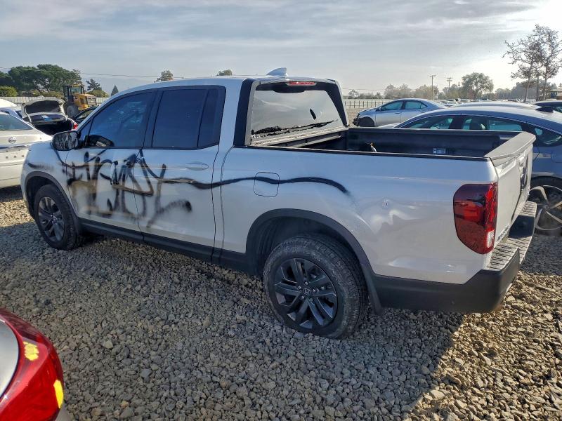 Photo 2 from auction – 2023 HONDA RIDGELINE with VIN 5FPYK3F10PB057347
