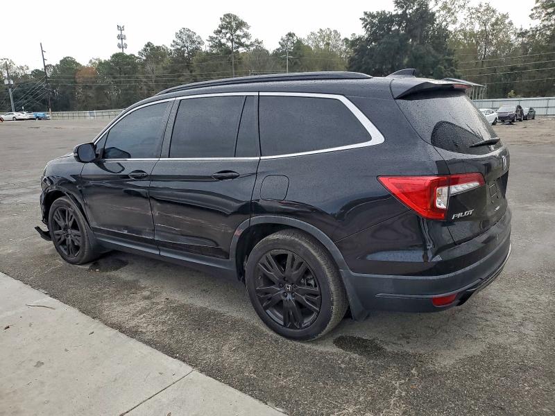 Photo 2 from auction – 2022 HONDA PILOT SE with VIN 5FNYF5H26NB002302