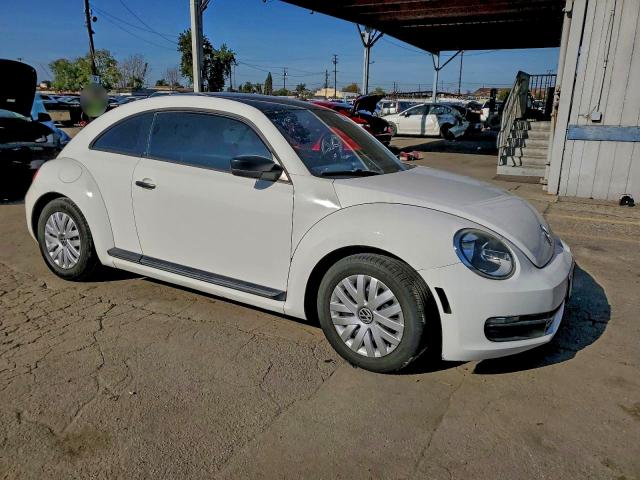 Photo 4 from auction – 2012 VOLKSWAGEN BEETLE with VIN 3VWFP7AT8CM637806
