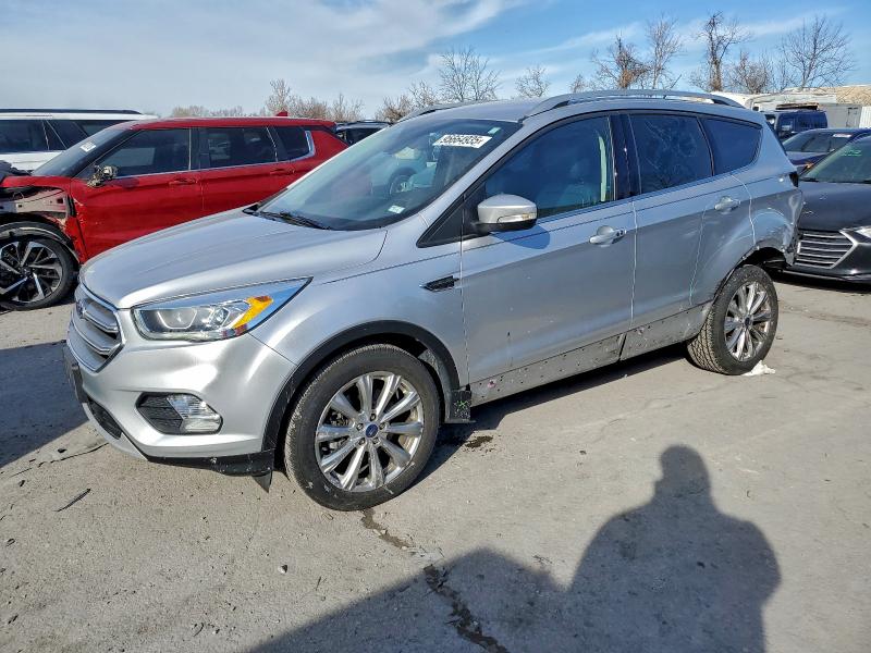 FORD ESCAPE TIT 2017 with VIN 1FMCU9J91HUB89048 - Photo from auction