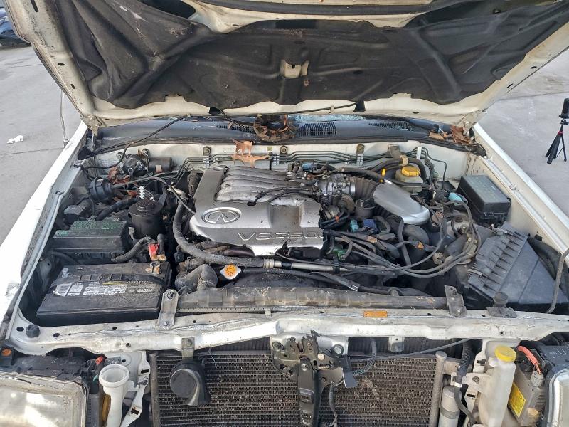 Photo 11 from auction – 2002 INFINITI QX4 with VIN JNRDR09Y72W258483