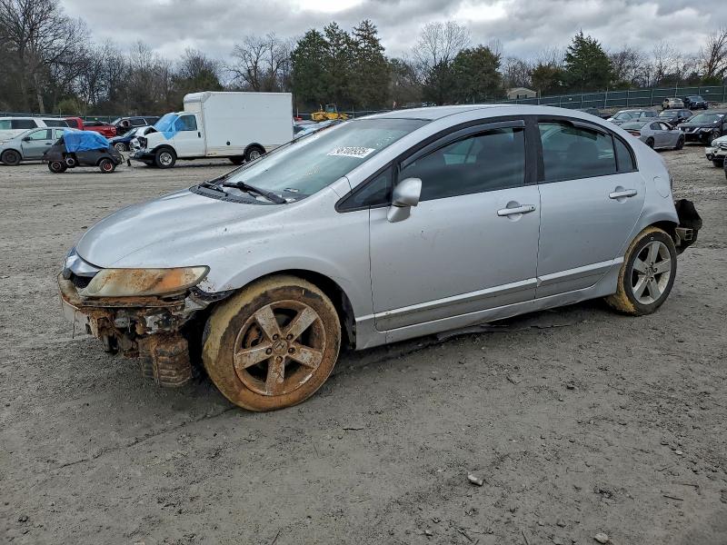 HONDA CIVIC LX-S 2010 with VIN 19XFA1F60AE070471 - Photo from auction