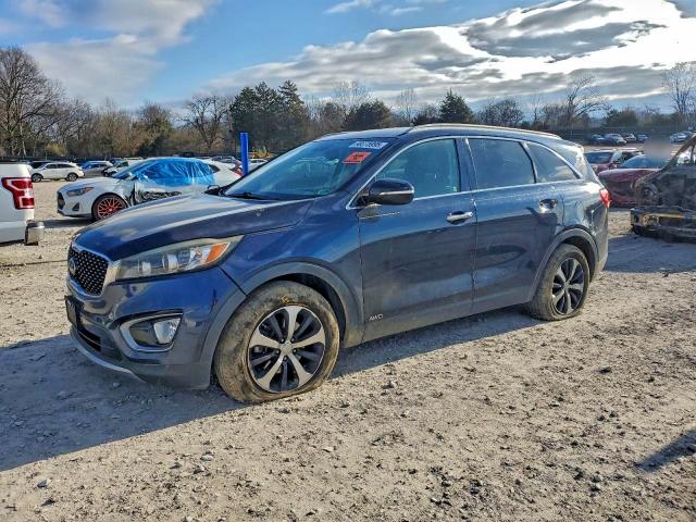 KIA SORENTO EX 2016 with VIN 5XYPHDA13GG007468 - Photo from auction