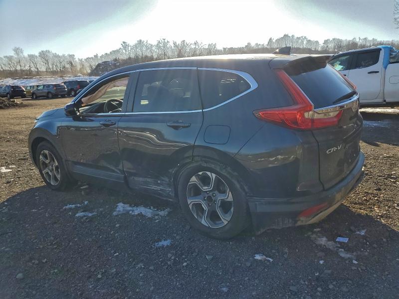 Photo 2 from auction – 2017 HONDA CR-V EX with VIN 5J6RW2H53HL028302